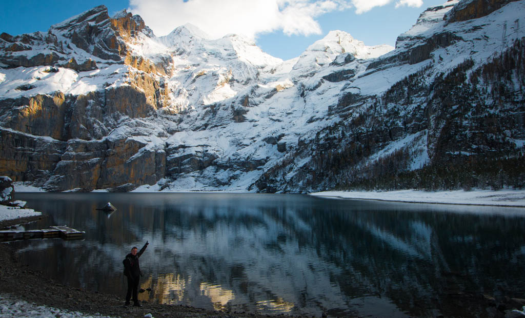 Obligatory 'point at the thing you worked hard to see' pose shore-side at Oeschinen Lake